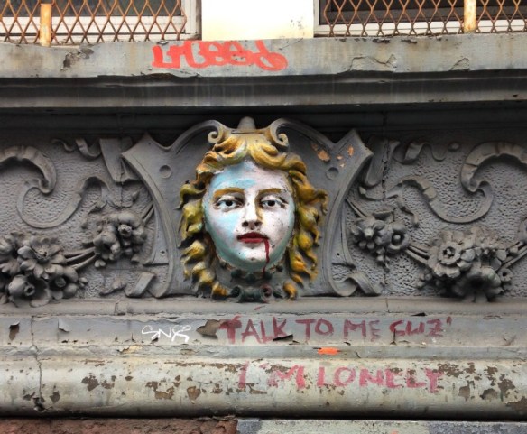 An embellished lady gargoyle on 98 St. Marks Place